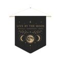 Live by the Moon pennant with gold lunar artwork on charcoal
