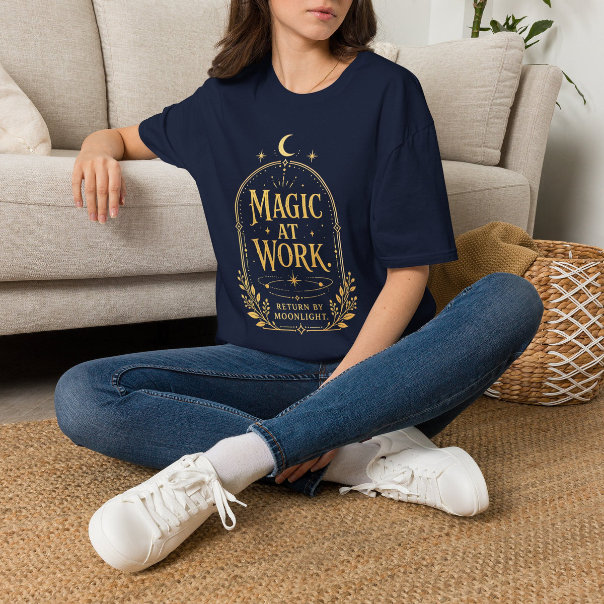Black celestial graphic tee with antique-gold artwork