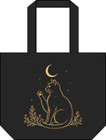 Black Tivis celestial cat shoulder tote with antique-gold crescent moon, stars, raised paw, and botanical artwork