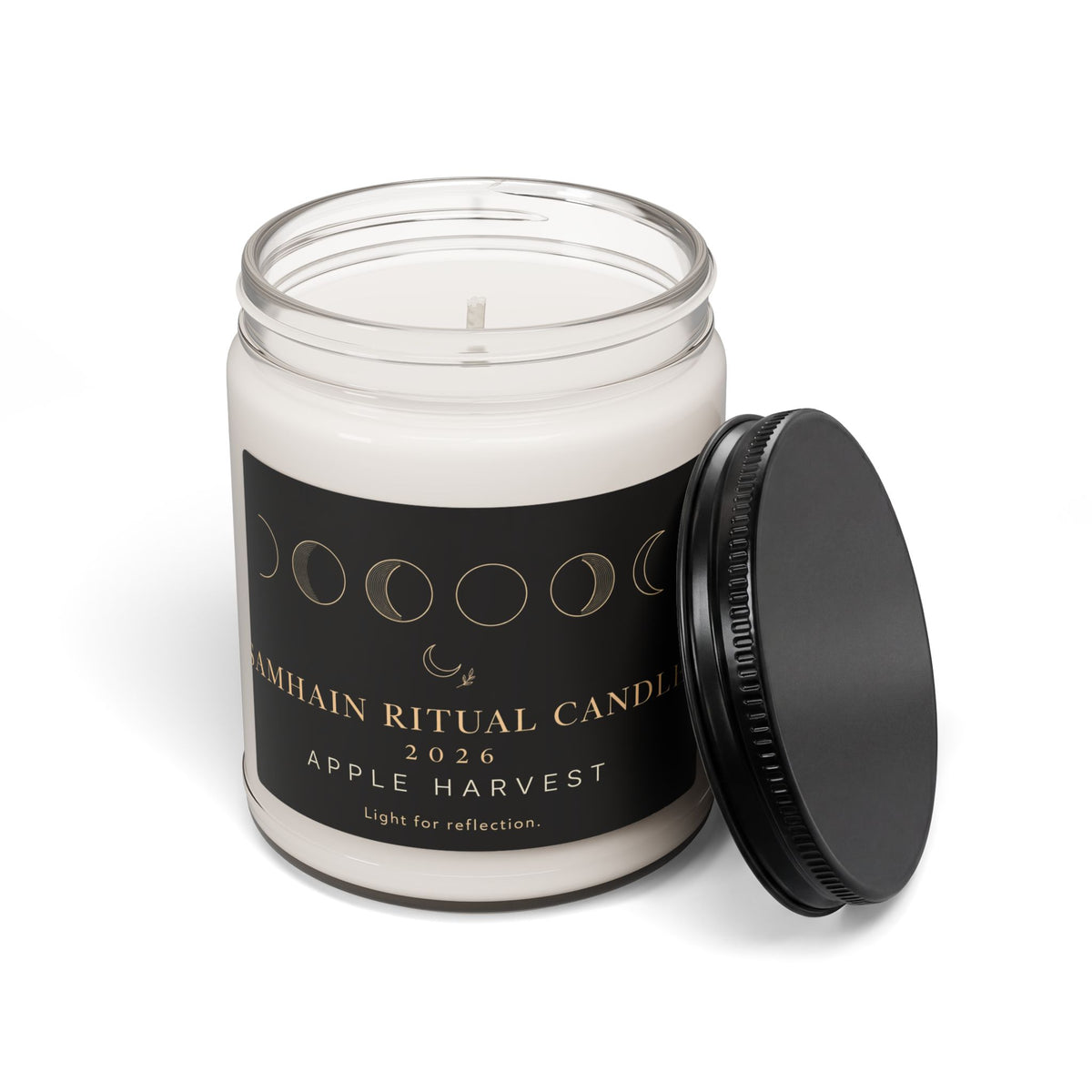 Open Apple Harvest Samhain Ritual Candle with black lid beside the clear glass jar