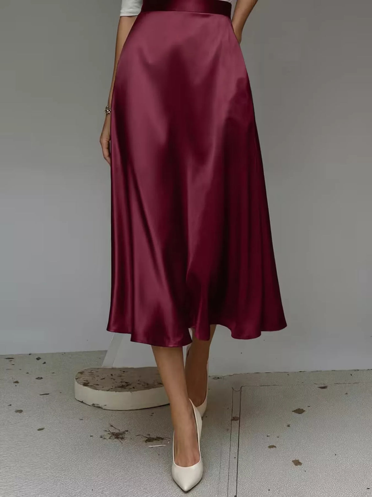 Flowing satin midi skirt with an A-line silhouette and pockets - alternate product view
