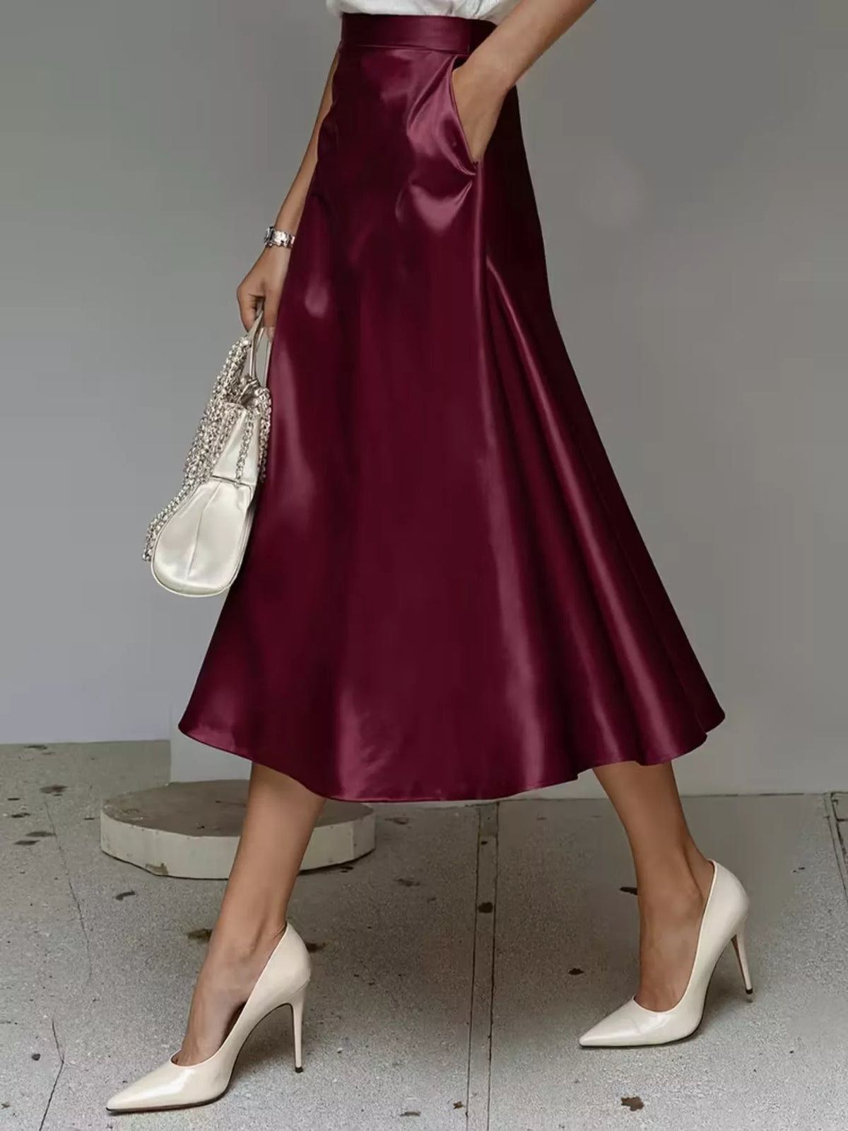 Flowing satin midi skirt with an A-line silhouette and pockets - alternate product view
