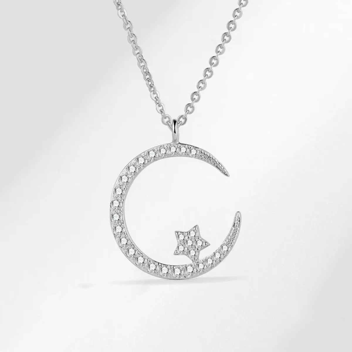 Crescent moon and star pendant necklace with zircon accents - alternate product view