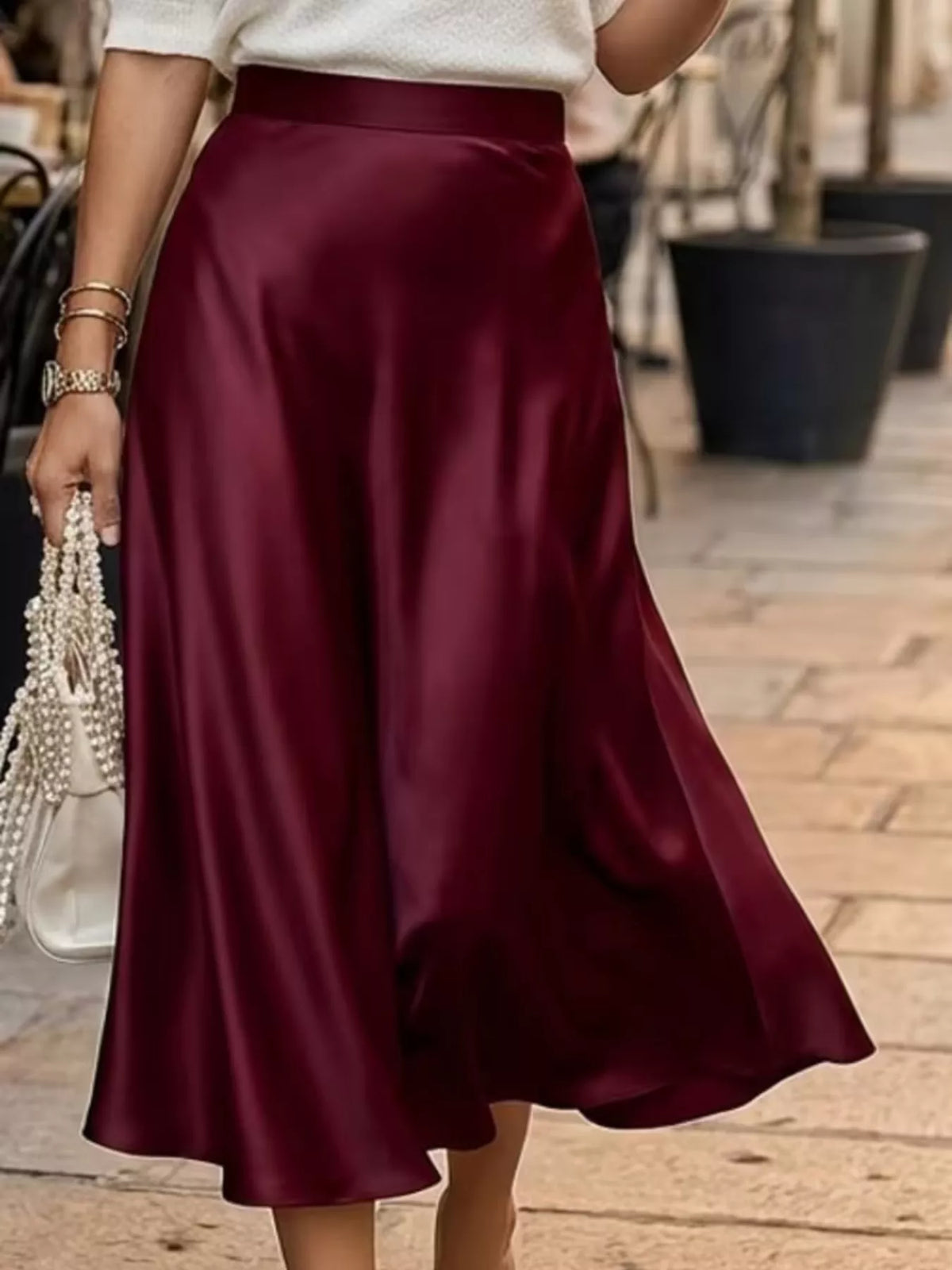 Flowing satin midi skirt with an A-line silhouette and pockets - alternate product view